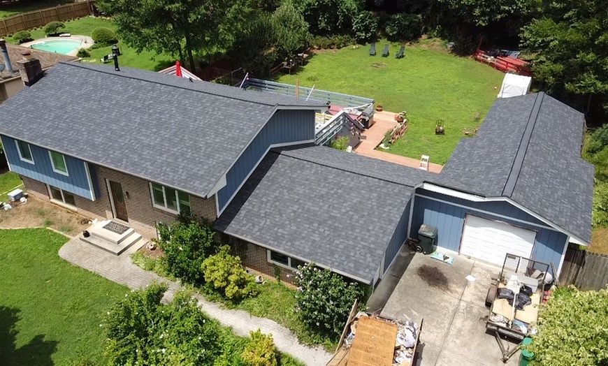 Image 1: Complete Roof Tune Up with Full Caulking and Inspection Service