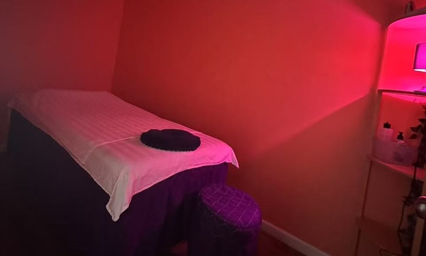 Image 3: Relax with 60-Minute Deluxe Body or Custom Combo Massage with Hot Stone & Optional Massage Oil (Up to 61% Off)
