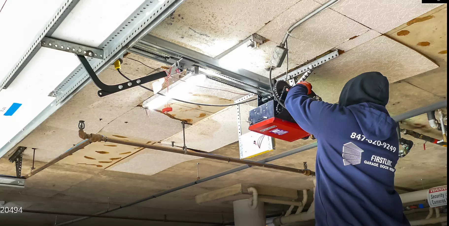 Experience Firstline Garage Door Repair Inc.'s tune-up options with up to 40% discount for cables and rollers - Primary Image