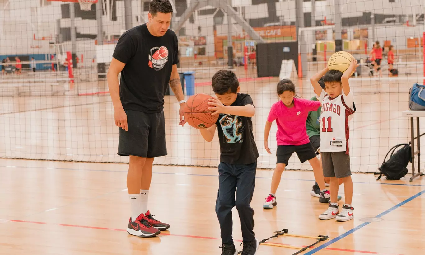 Experience Up Your Performance Basketball's Half Day Summer Youth Camp with options for one or two, up to 40% off - Primary Image