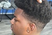 Refresh Your Style with One Men's Haircut with Shampoo Service & Face Treatment ( Up to 50% Off ) - Second Medium