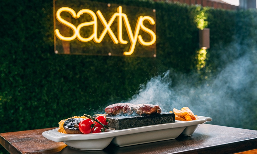 Image 1: Up to 48% Off on British Cuisine at Saxtys