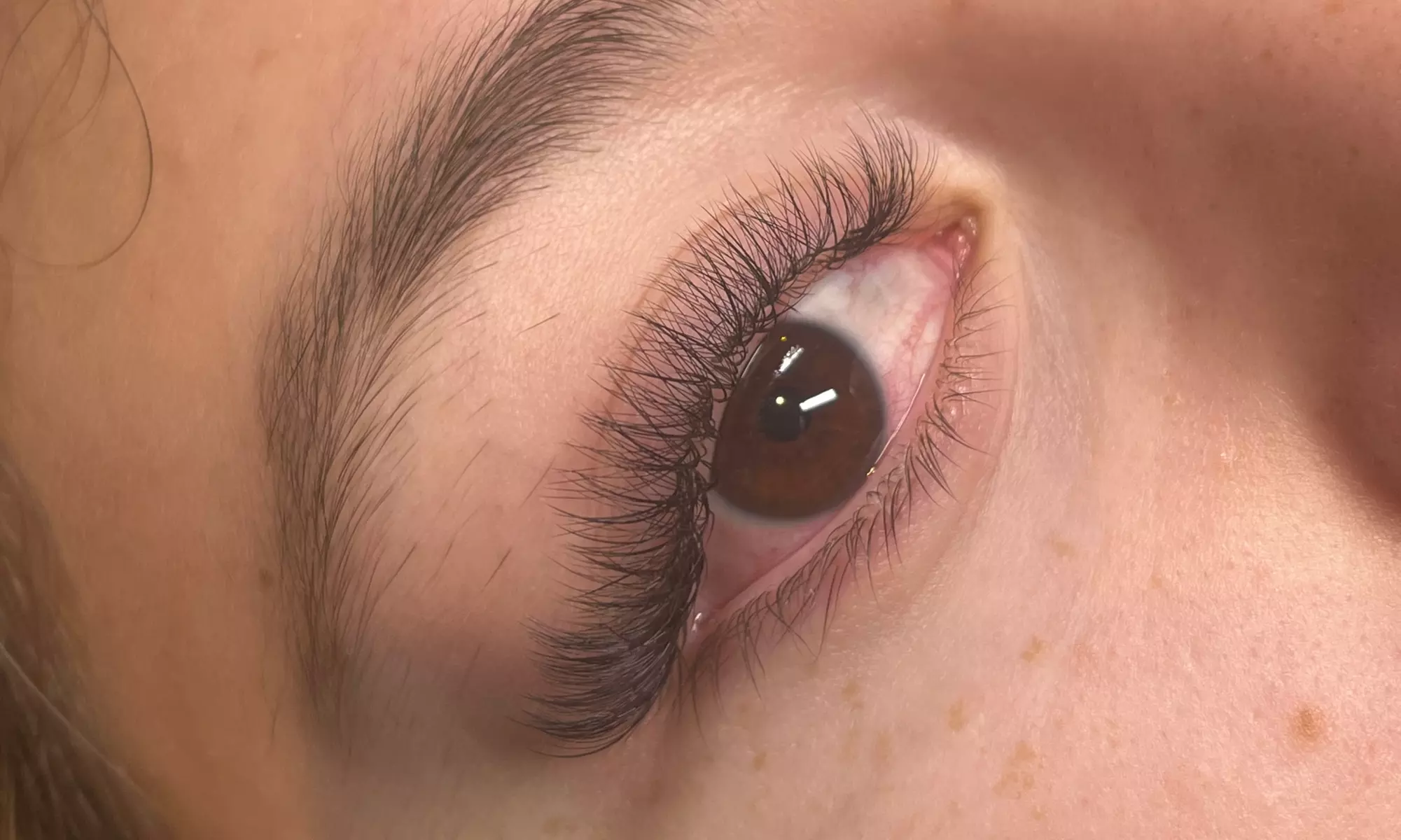 Doll Face Esthetics offers lash transformations with Classic, Hybrid, and Volume Eyelash Extensions up to 50% off - Second Medium