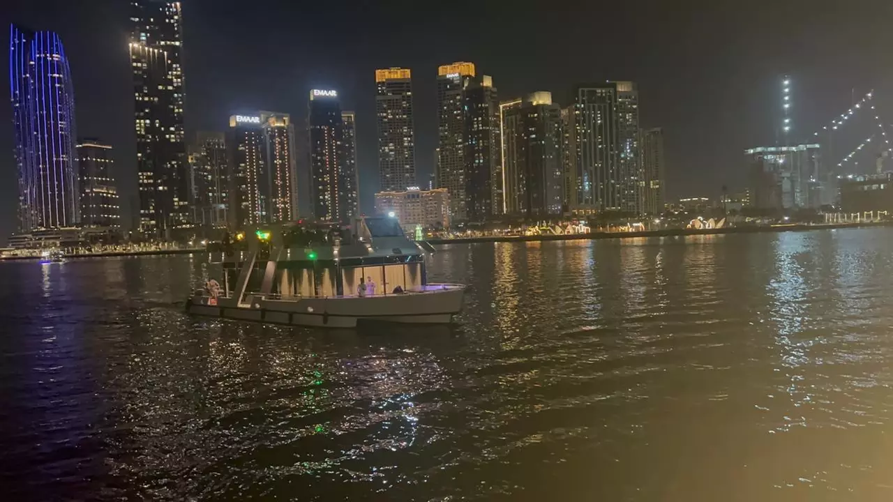 Dubai Canal dhow dinner cruise with soft beverages and live shows