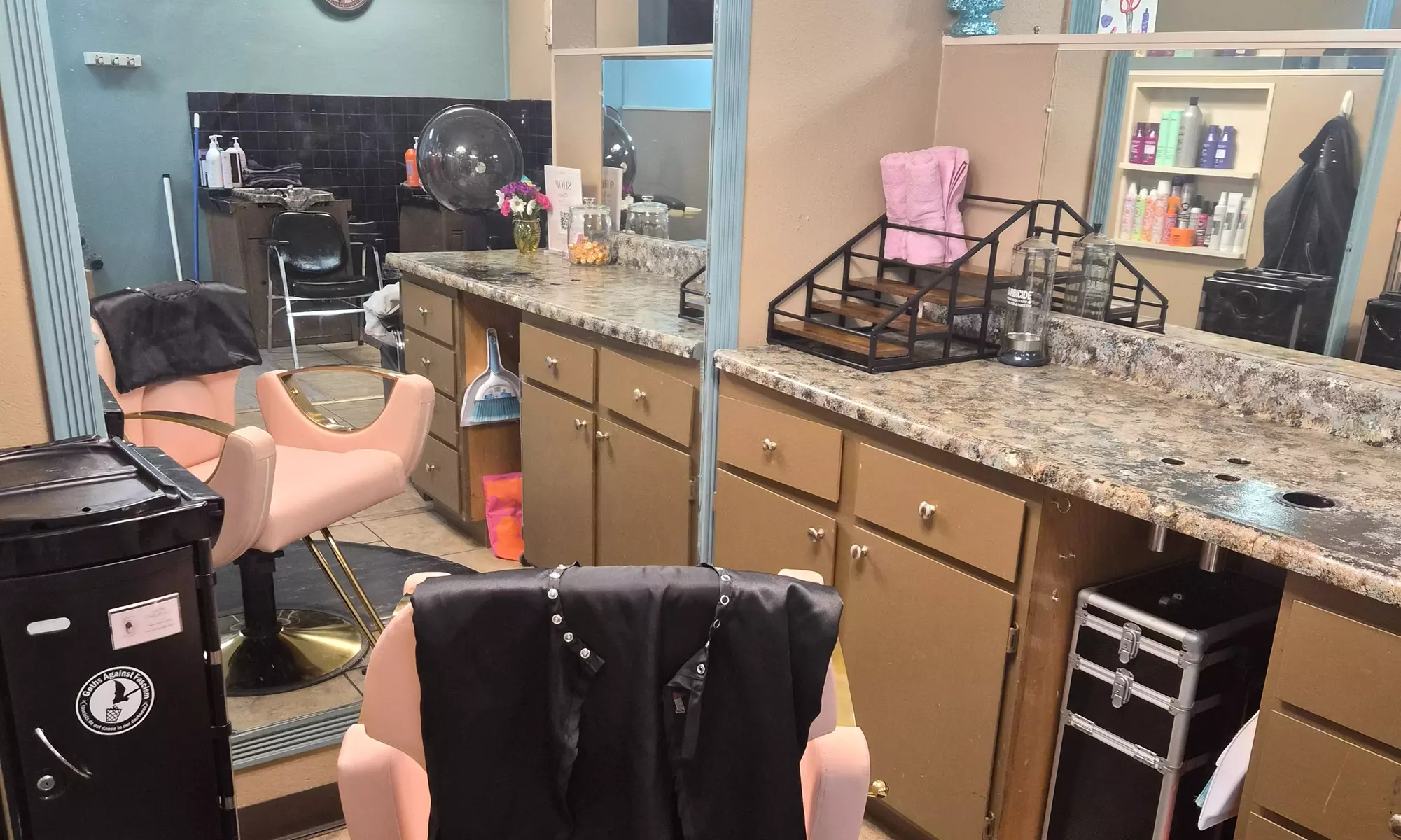 Transform Your Look: One Haircut with Shampoo and Styling or Any Color