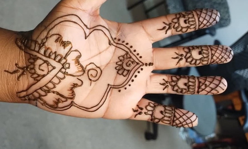 Image 13: Henna Hand for Cultural Elegance!