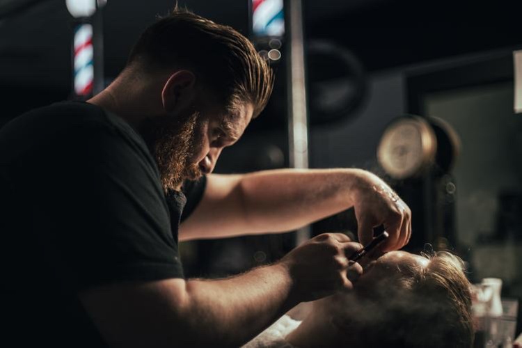 Snip, Style, and Shine: Beard, One Men's Haircut and Style or Facial