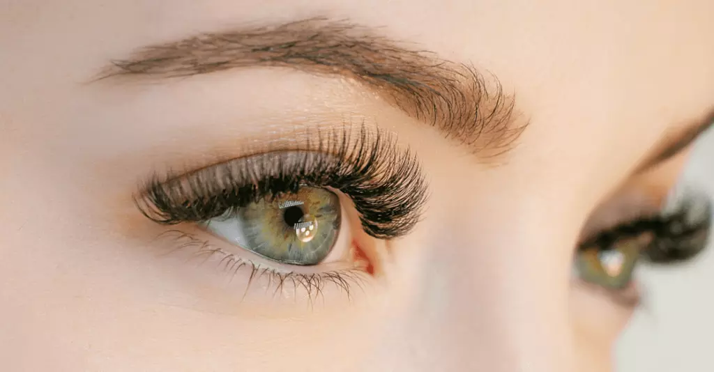Discover Pretty Chic's diverse eyelash extensions like classic and hybrid styles, offering up to 61% off for a stunning look. - Primary Image