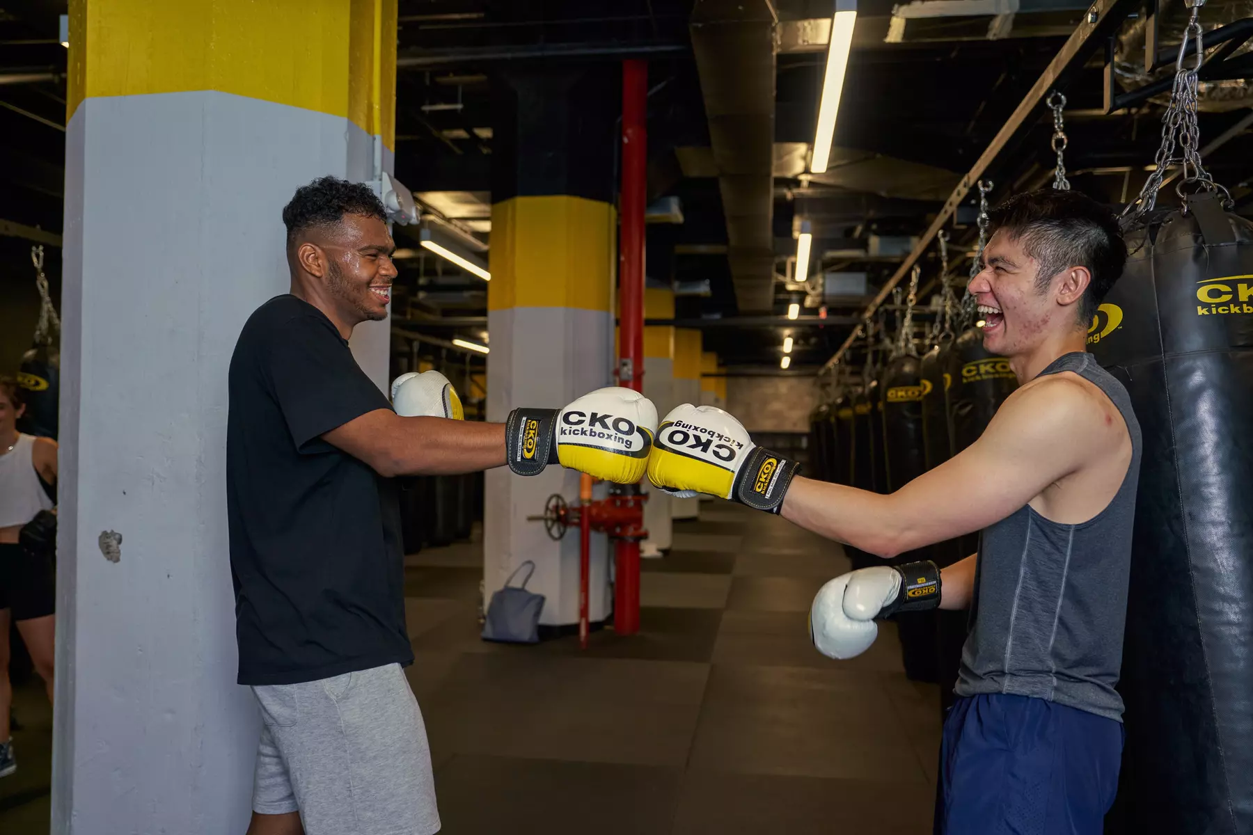Experience unlimited CKO Kickboxing - Jersey City classes with premium gloves included, up to 49% off, for a full-body workout