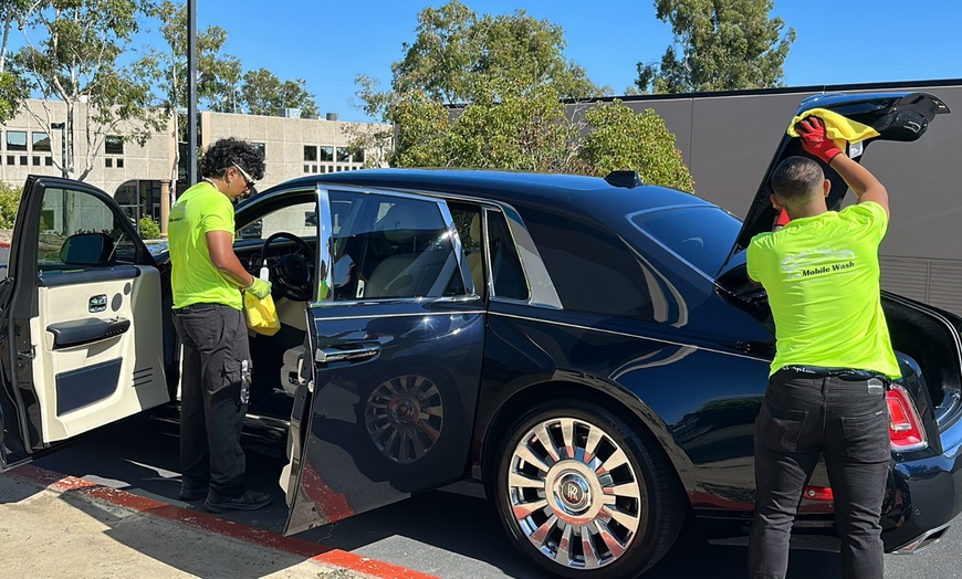 Image 1: Keep Your Car Fresh with EV Pro Details: Full Detail, Pet-Specific, and SUV Packages (Up To 30% Off)