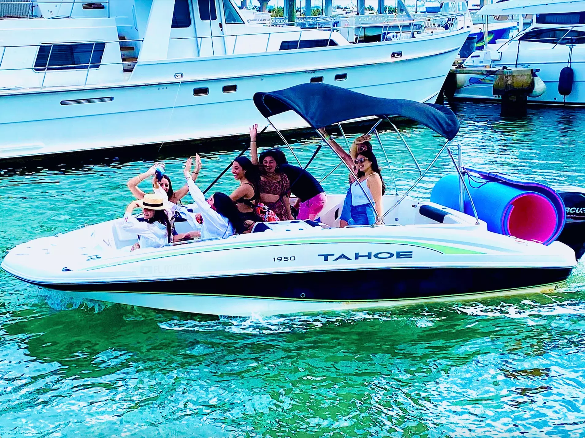 Experience Aquarius Boat Rental and Tours with a 4-hour cruise and floating mat for up to 6 people, saving up to 50% - Second Medium