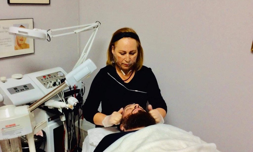 Image 2:  Lymphatic Drainage Massage with Red Light Therapy plus Essential Oils