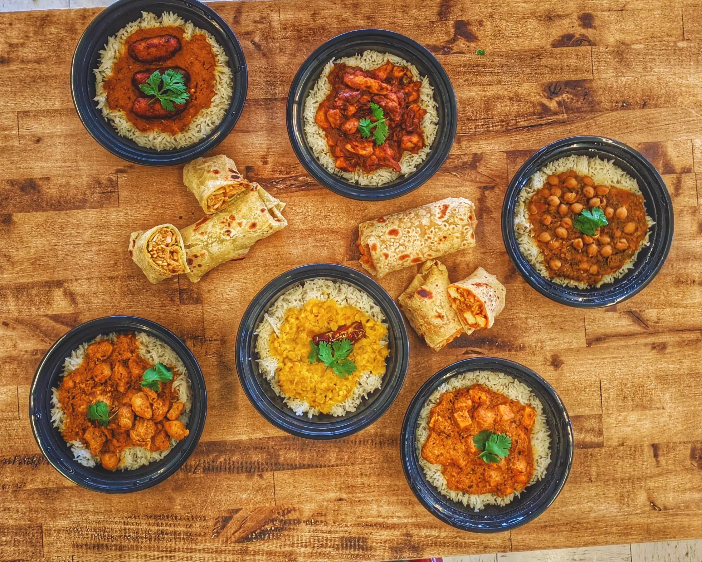 Up to 40% Off on Indian Cuisine at Munchkart - Primary Image