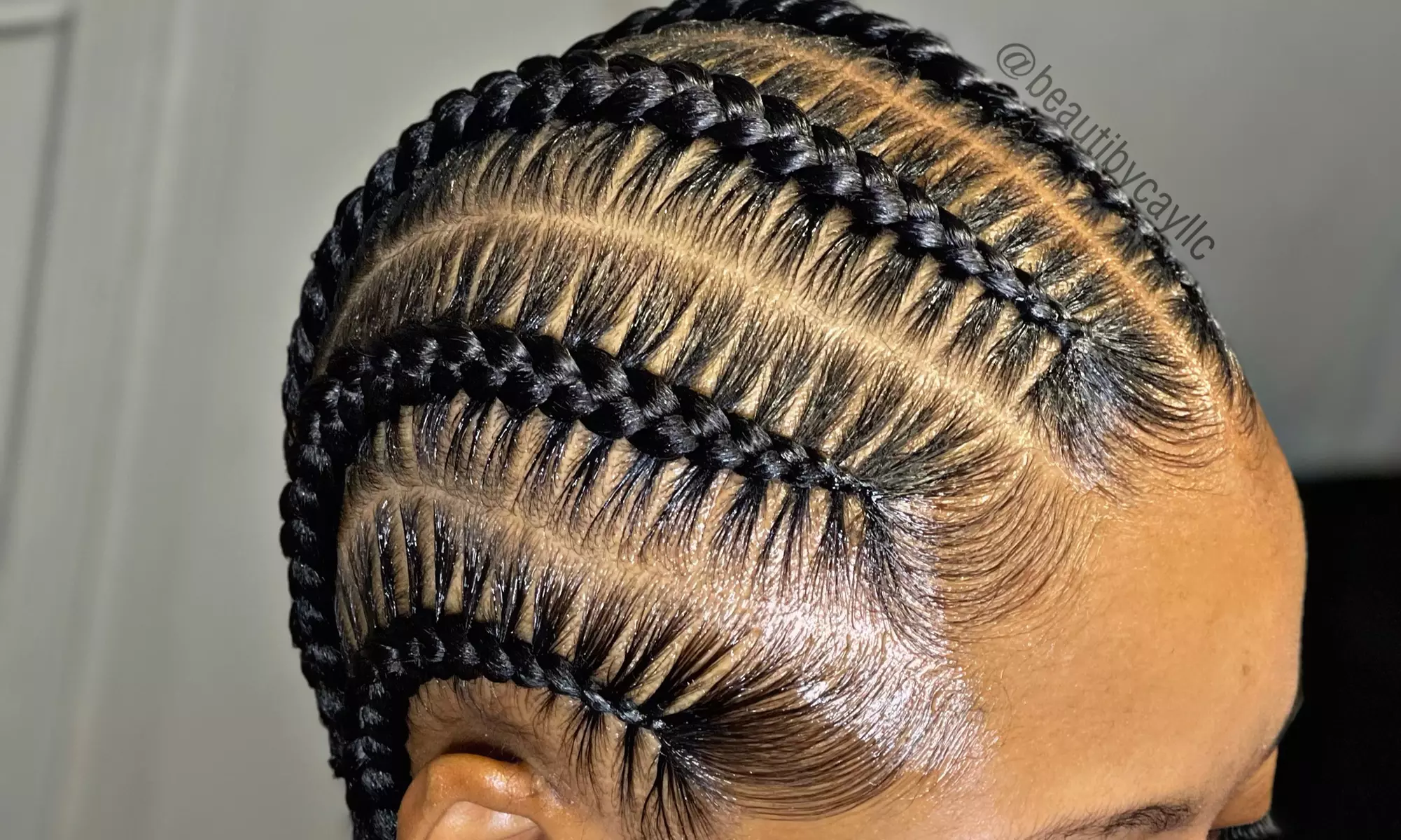 Beauti By Cay LLC offers 2 Pocahontas Braids, 6 Stitch Braids, and Large Knotless Braid Session with up to 50% off - Primary Image