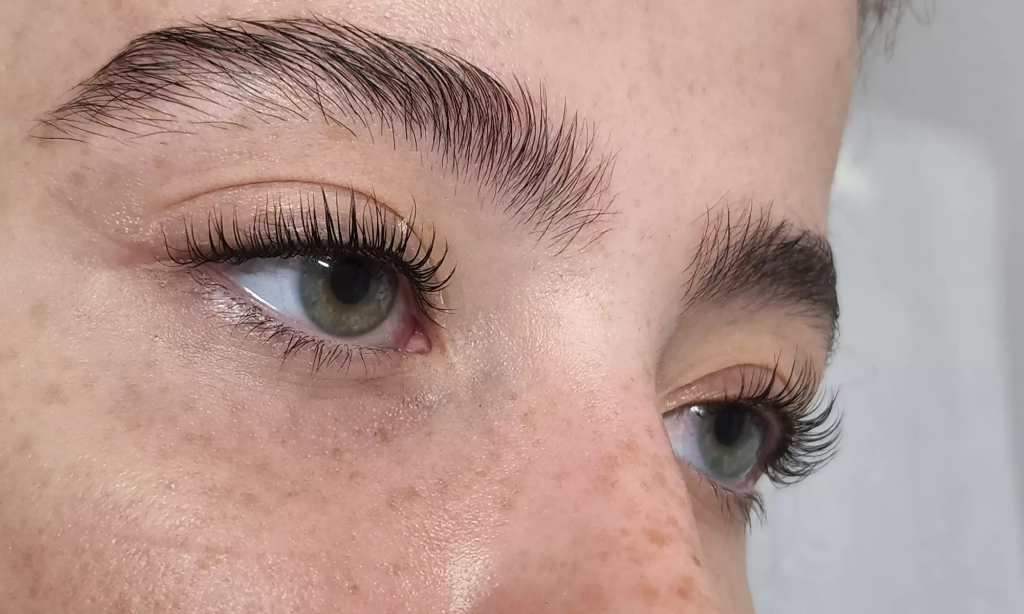 Experience Lasting Impressions' eyelash lift and tint treatment options with up to 50% off for beautifully enhanced lashes - Primary Image