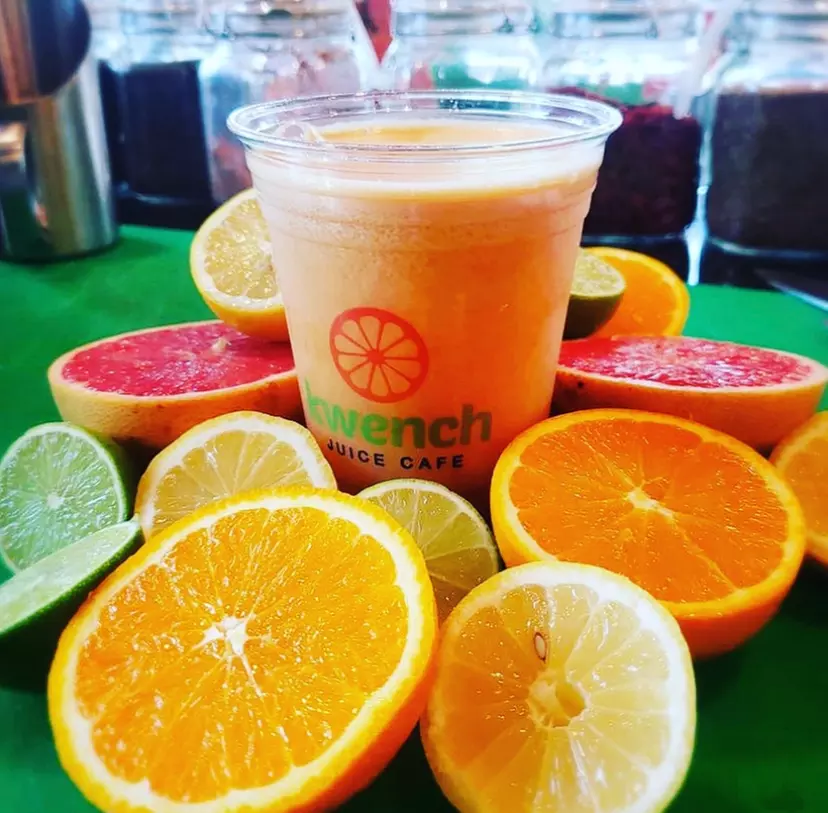 Enjoy a combo meal with wrap and smoothie at Kwench Juice Cafe, offering up to 39% off for a refreshing treat. - Primary Image