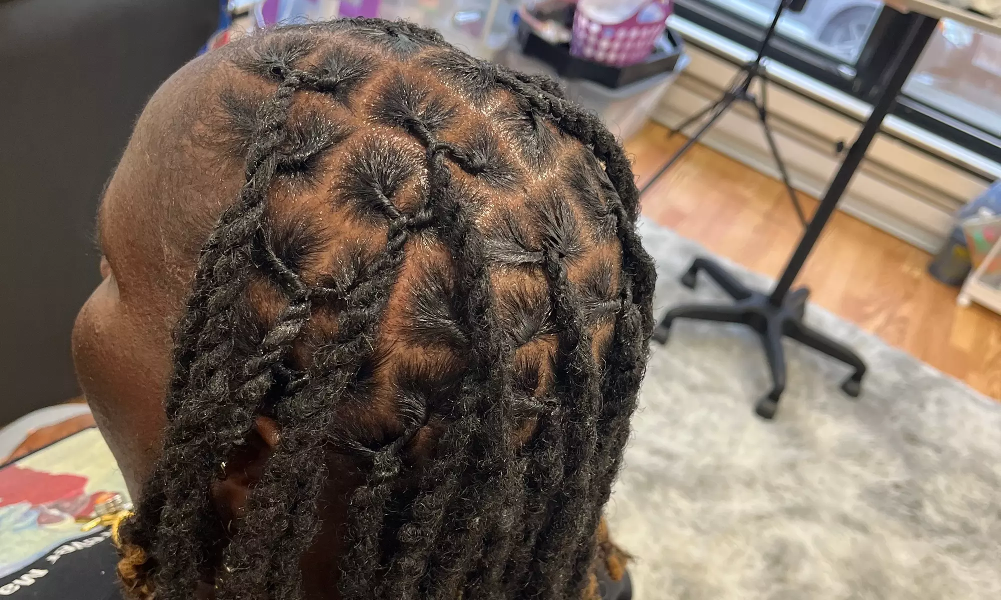 Get Fresh Loc Maintenance with Wash and Re-Twist Options
