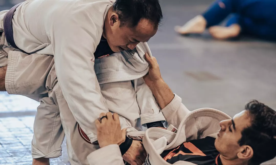 Experience Gracie Barra's unlimited Jiu-Jitsu, Yoga & Kickboxing classes for two weeks or a month with up to 44% off - Second Medium