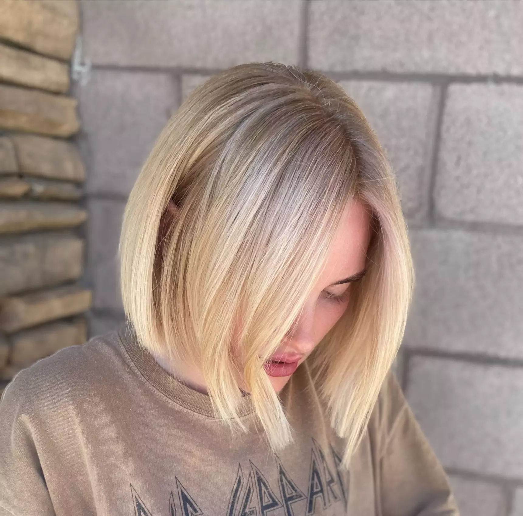 Give a Professional Touch to Hair: Brazilian Blowout or Root Color & Brazilian Blowout Special (Up to 68% Off)
