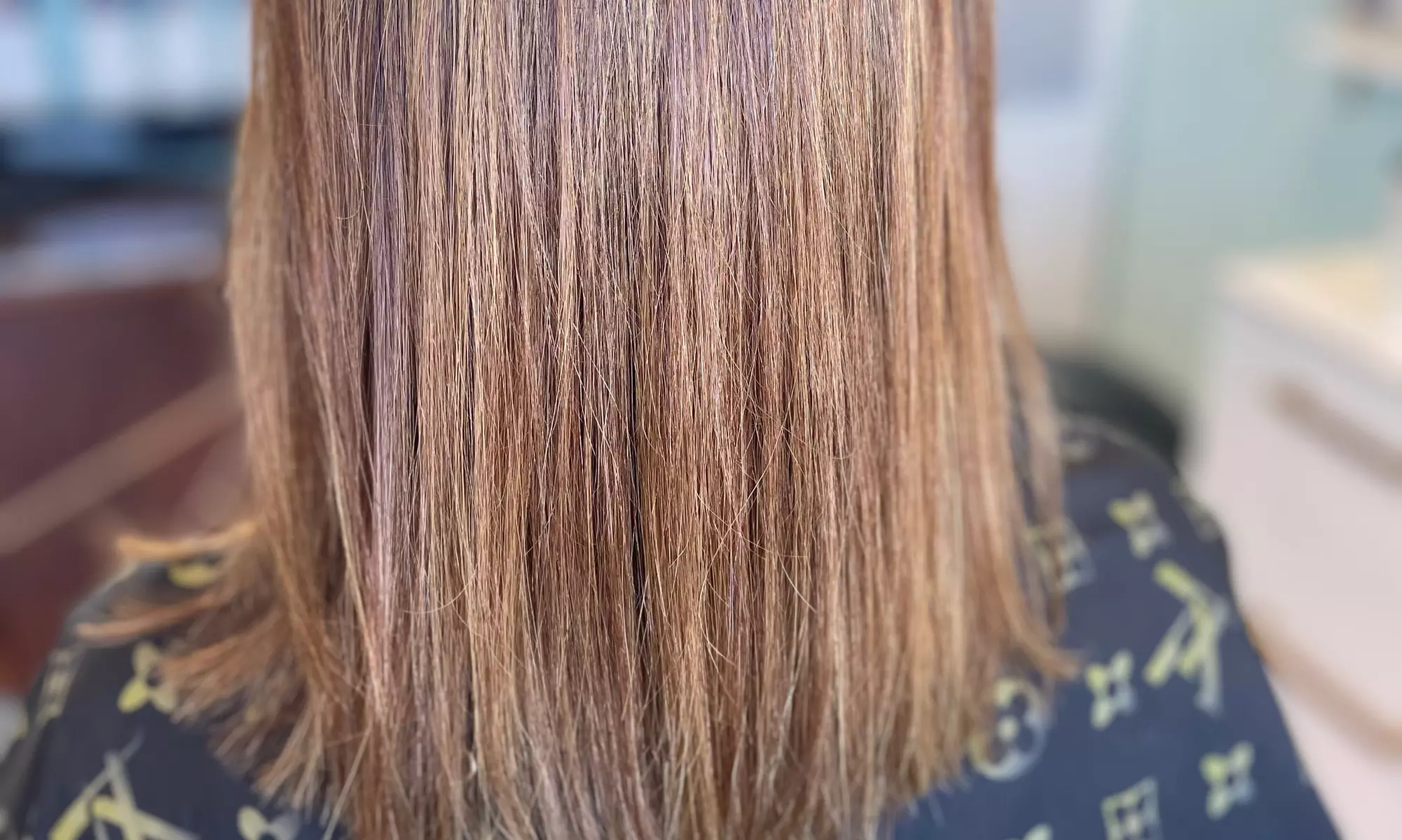 Experience a Brazilian Blow-Out or Add a Haircut for Smooth Hair