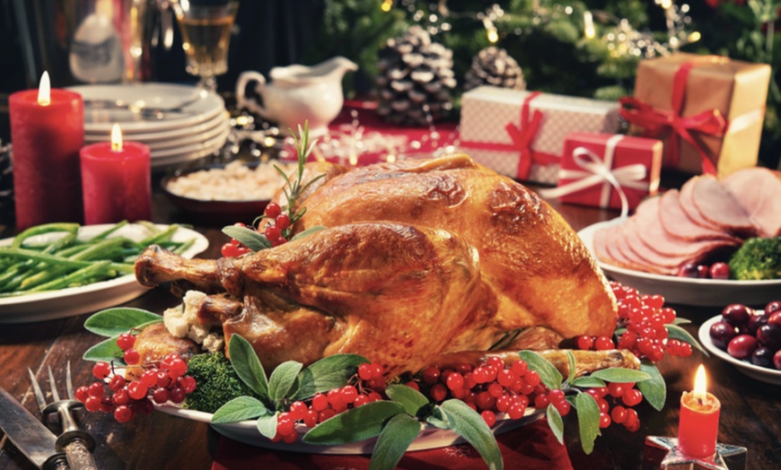 Image 1: Roast Turkey with Sides + Cake from Spices from 5* Movenpick Al Mamzar