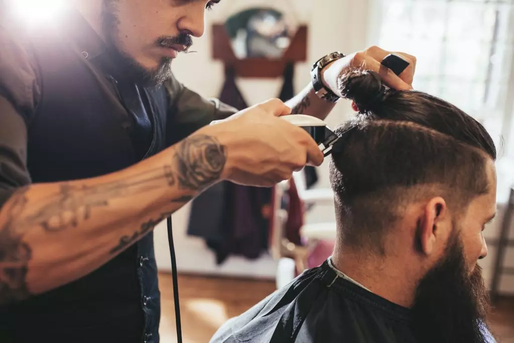 Discover Douglas J School Of Barbering's haircut and shave services with up to 35% off, offering fresh styles and trims. - Primary Image
