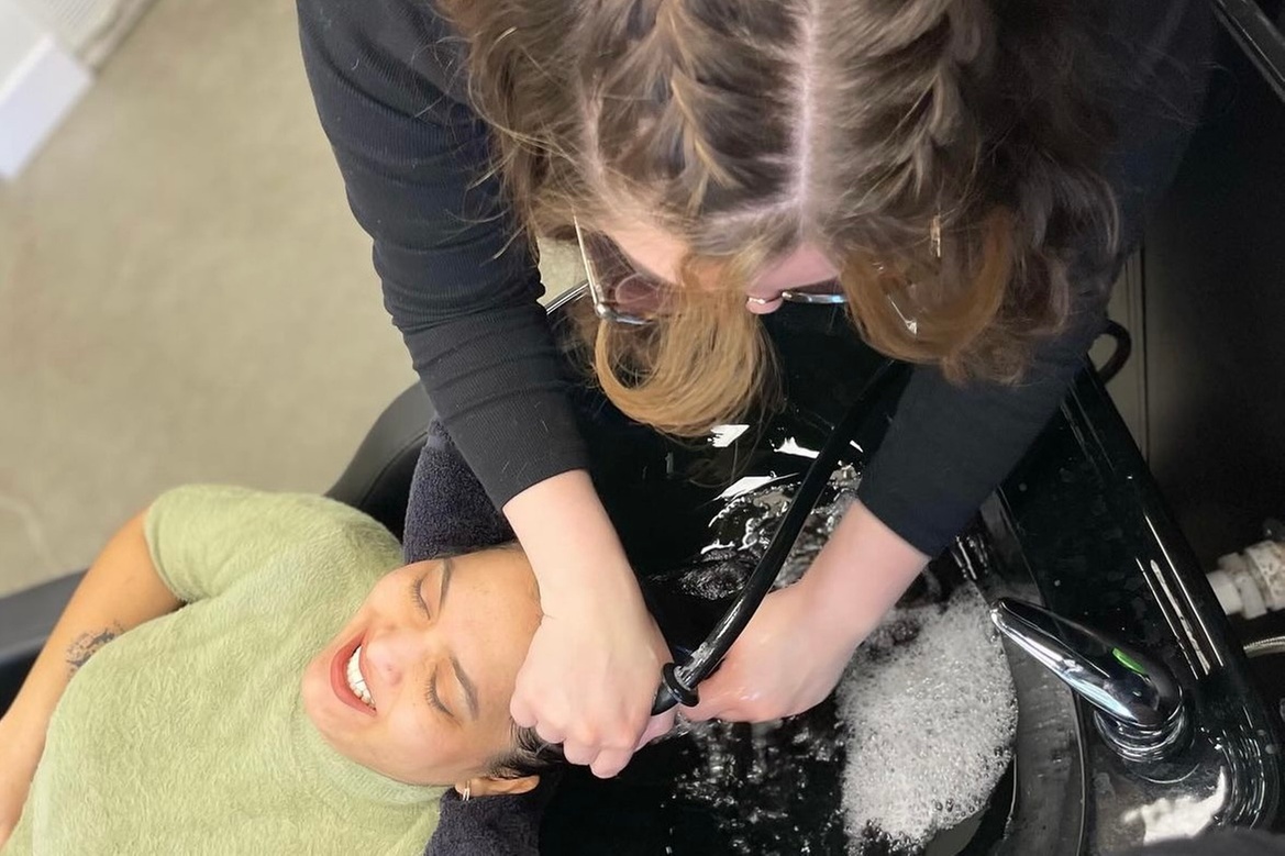 Choice of Woman's Haircut, Root Touchup, or Full Highlights