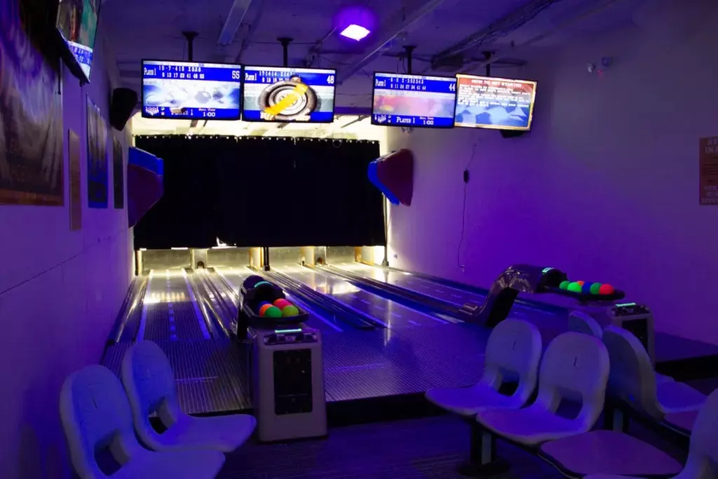 Enjoy a delightful experience at Hoboken Golf with mini-bowling and pizza for groups, up to 32% off - Second Medium