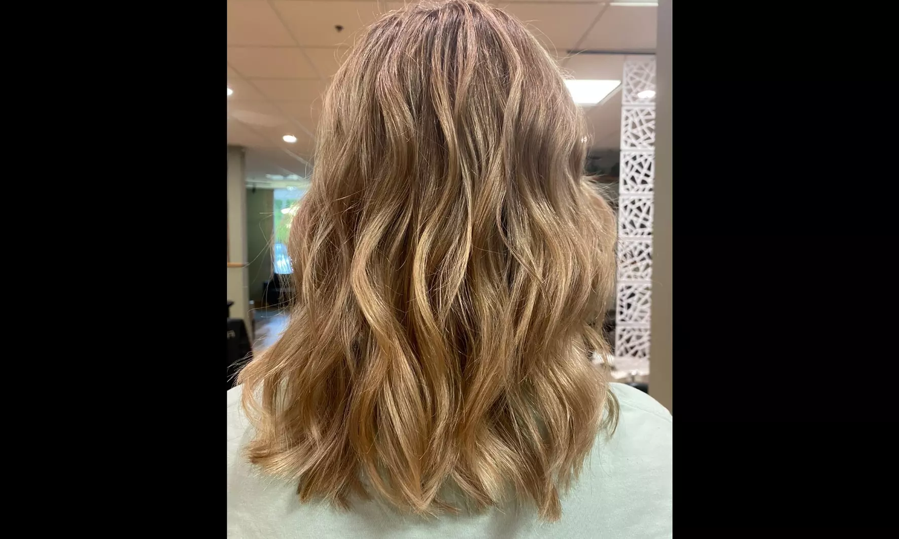 Get the ultimate Brazilian blowout treatment with Glammed by Ari, offering smooth hair up to 50% off. - Second Medium