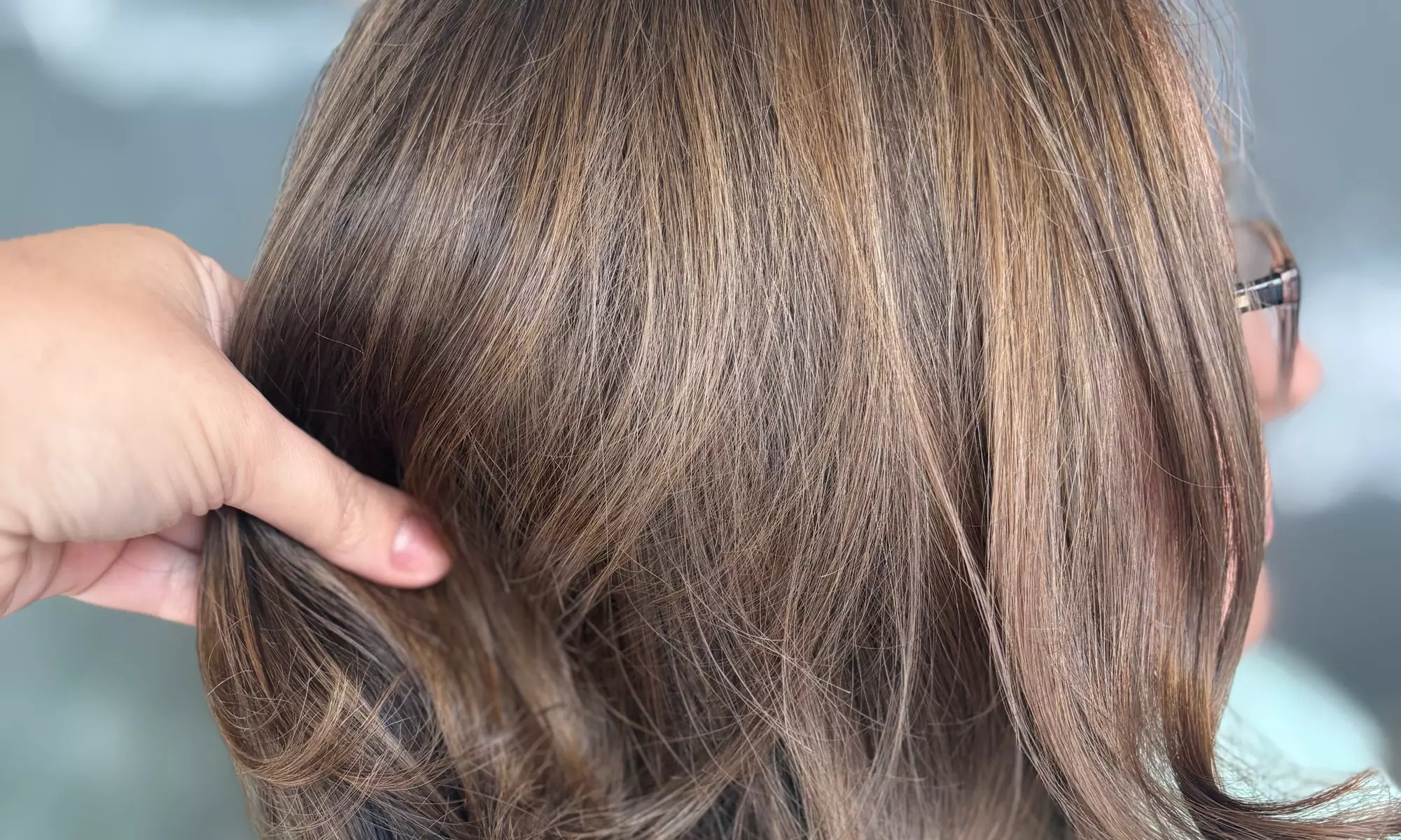 Transform Your Look with a Woman's Haircut, Color, Style