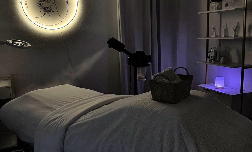 Image 1: Glow with 60-Minute Custom Facial and Neck Massage or with Dermaplane