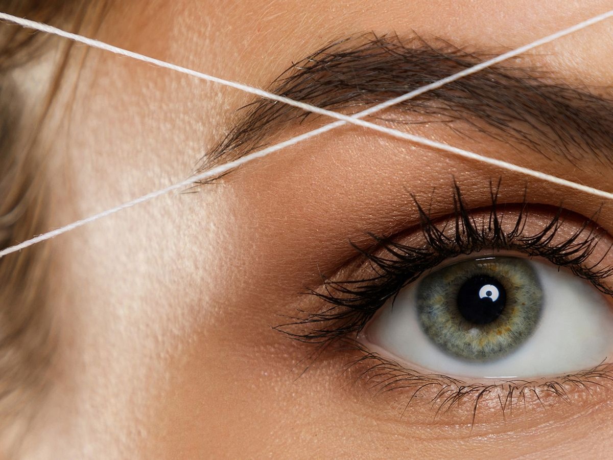 Eyebrow threading and tinting for a polished look