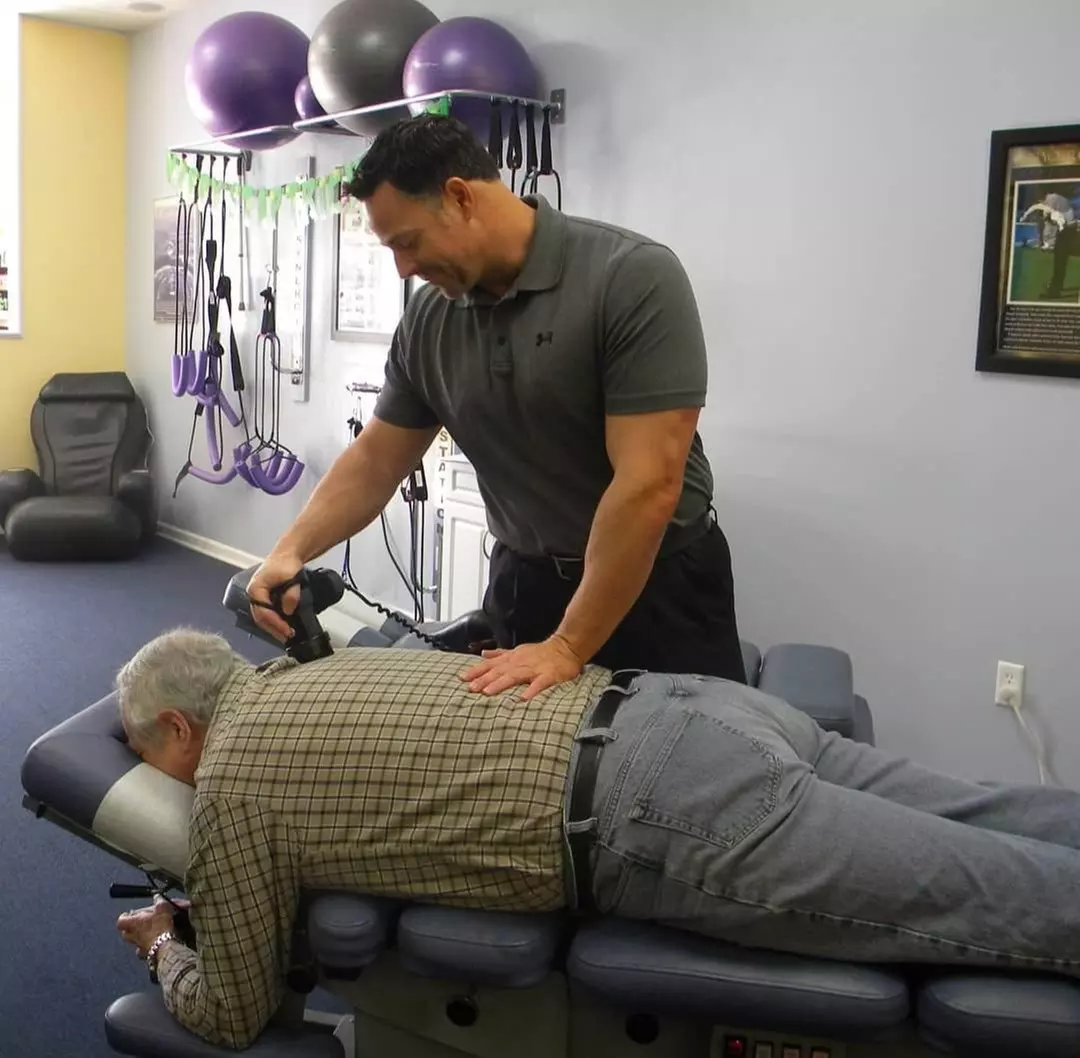Experience Toland Chiropractic Wellness Center's care with options for consultation, exam, X-rays, and up to 73% off adjustments - Primary Image