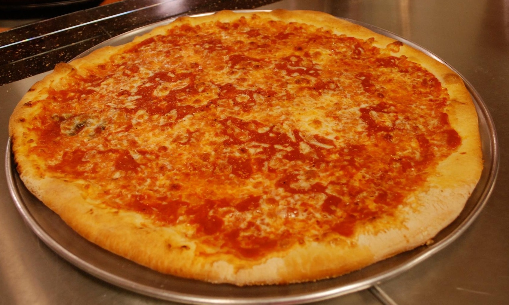 Food and Drink for Dine-in or Takeout at Delorenzo's Pizza (Up to 30% Off). Four Options Available. - Primary Image