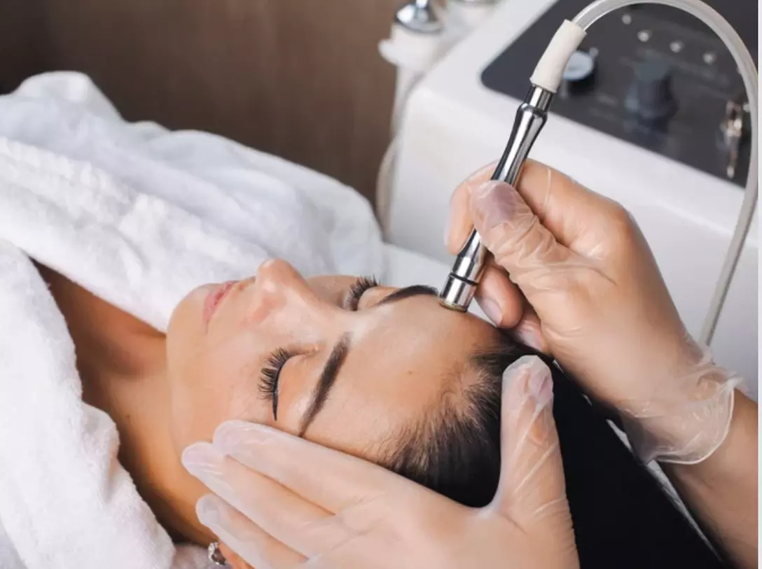 Transform Your Look at Infinite Glow Studio: Enjoy Up to 55% Off One Microdermabrasion or Dermaplane Facial! - Primary Image