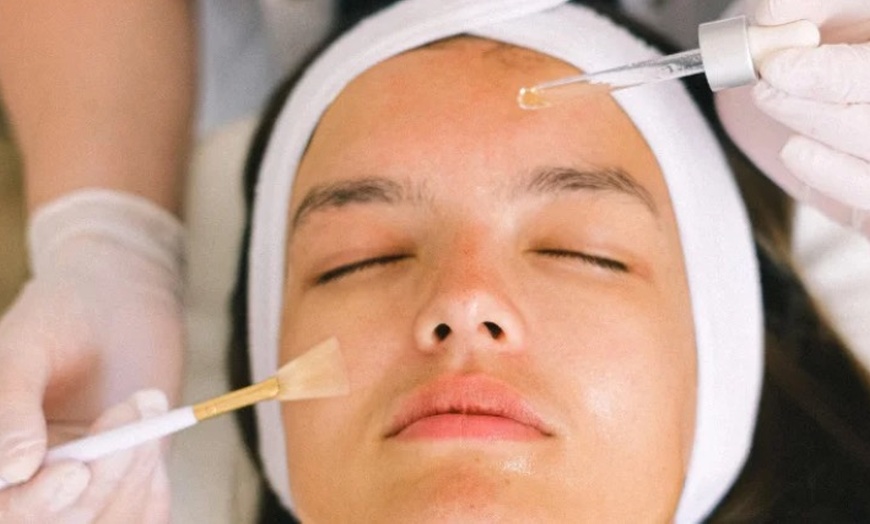 Image 1: One Customized ZO Skin Simulator Facial & LED Red Light Therapy Combo
