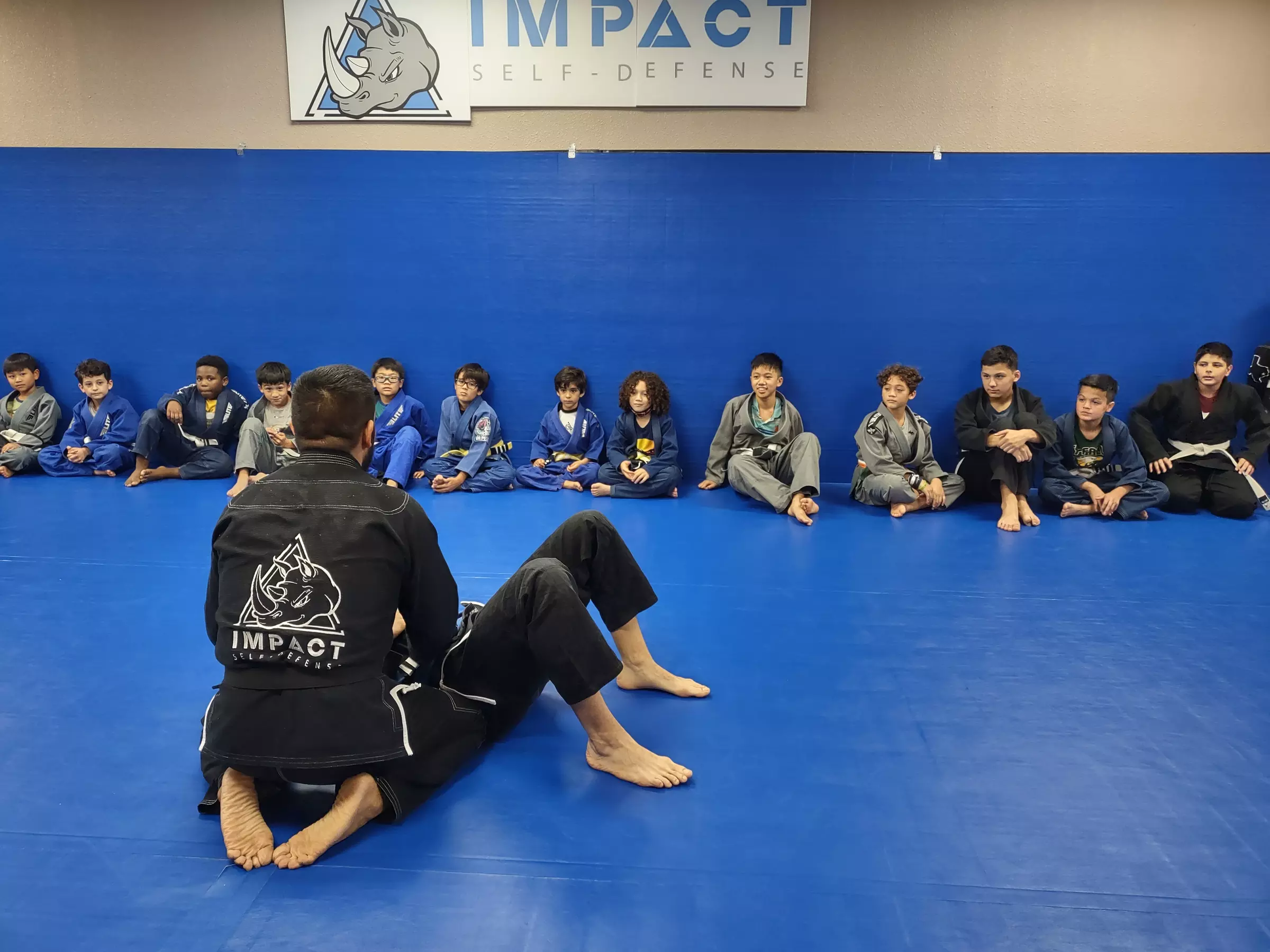 Discover Impact self-defense: Kids Martial Arts Classes for Ages 5-15 with up to 80% Off Emphasizing Self-Defense Skills - Primary Image
