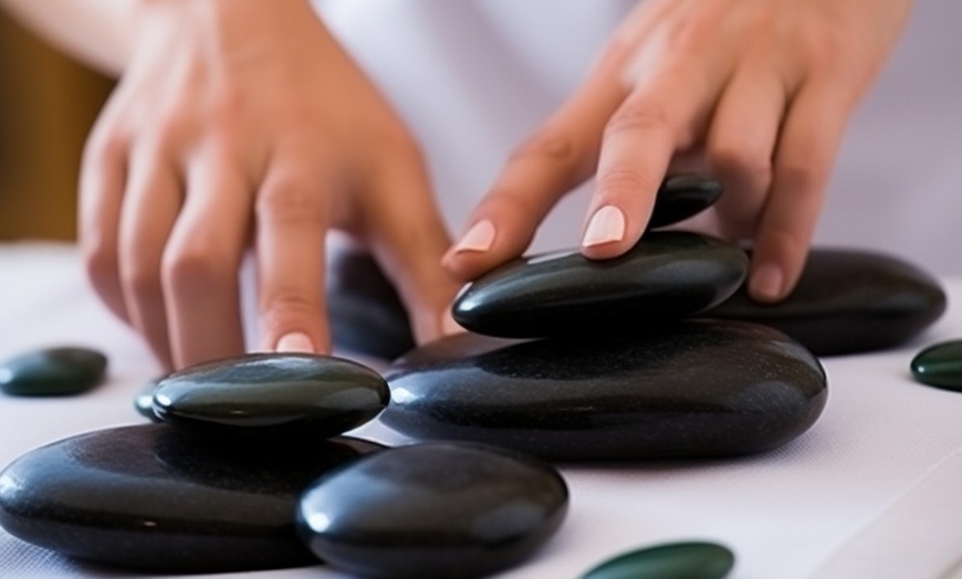 Image 1: Experience the Bliss of Hot Stone Massage!