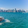 Image 1: Locals Ride the Water Taxi Miami Between Miami Beach Marina and Downtown (Bayside Marketplace) (Up to 75% Off)