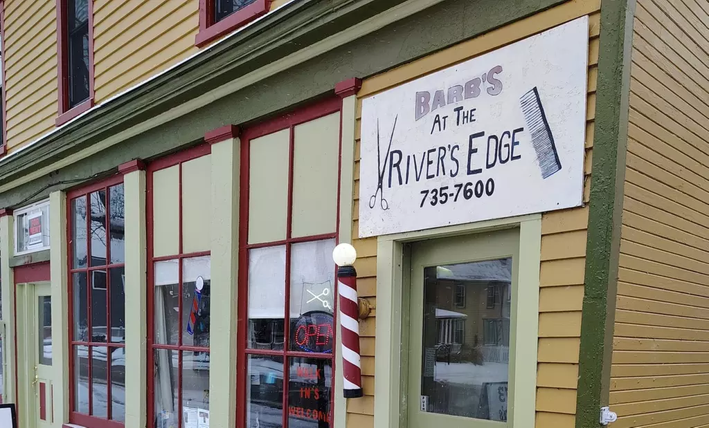 Elevate Your Style: Haircut with Partial or Full Highlights at The Rivers Edge Hair Salon ( Up to 34% Off ) - Primary Image