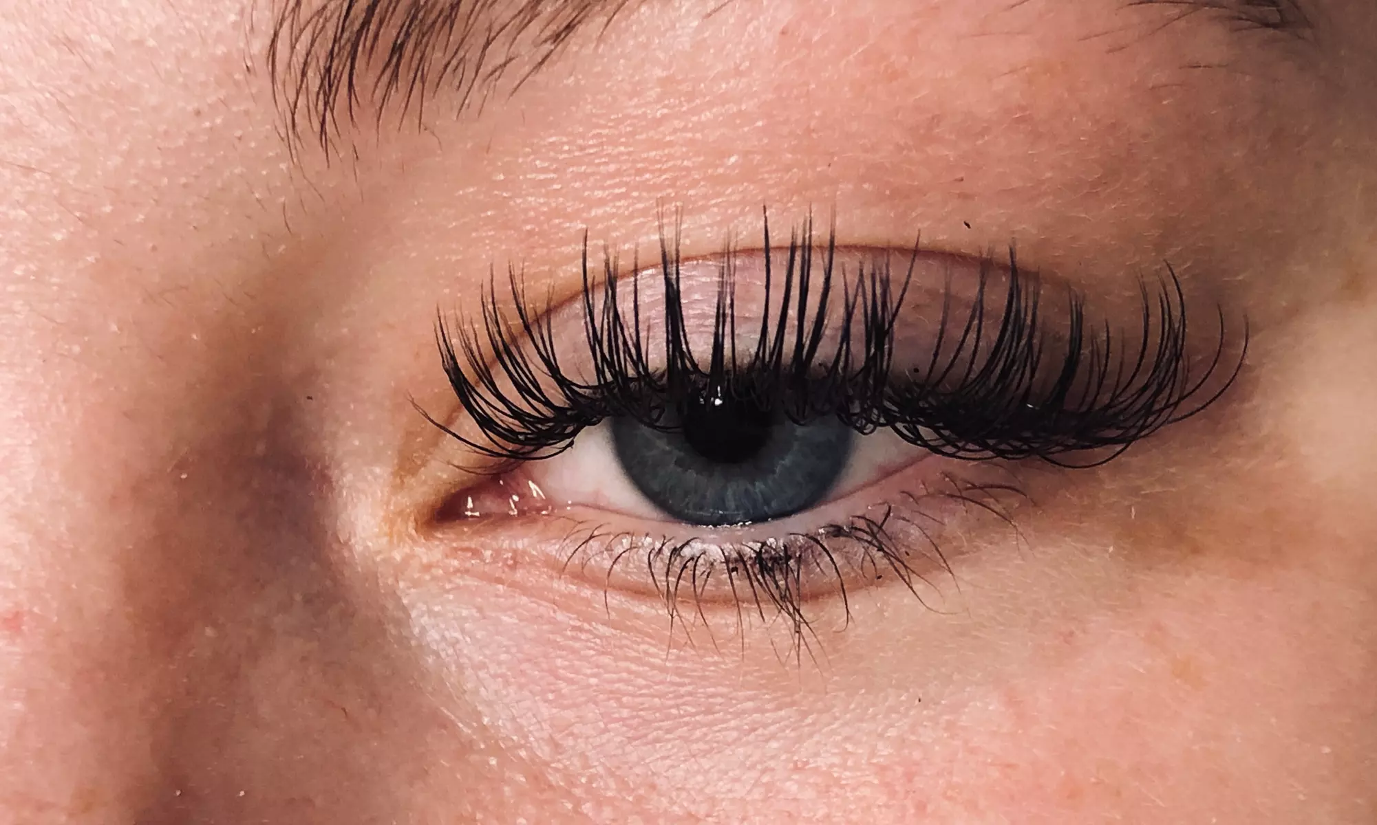 Luxe Vanity Salon's eyelash extensions offer options like classic, hybrid, or volume sets with fill-ins and up to 50% off - Primary Image