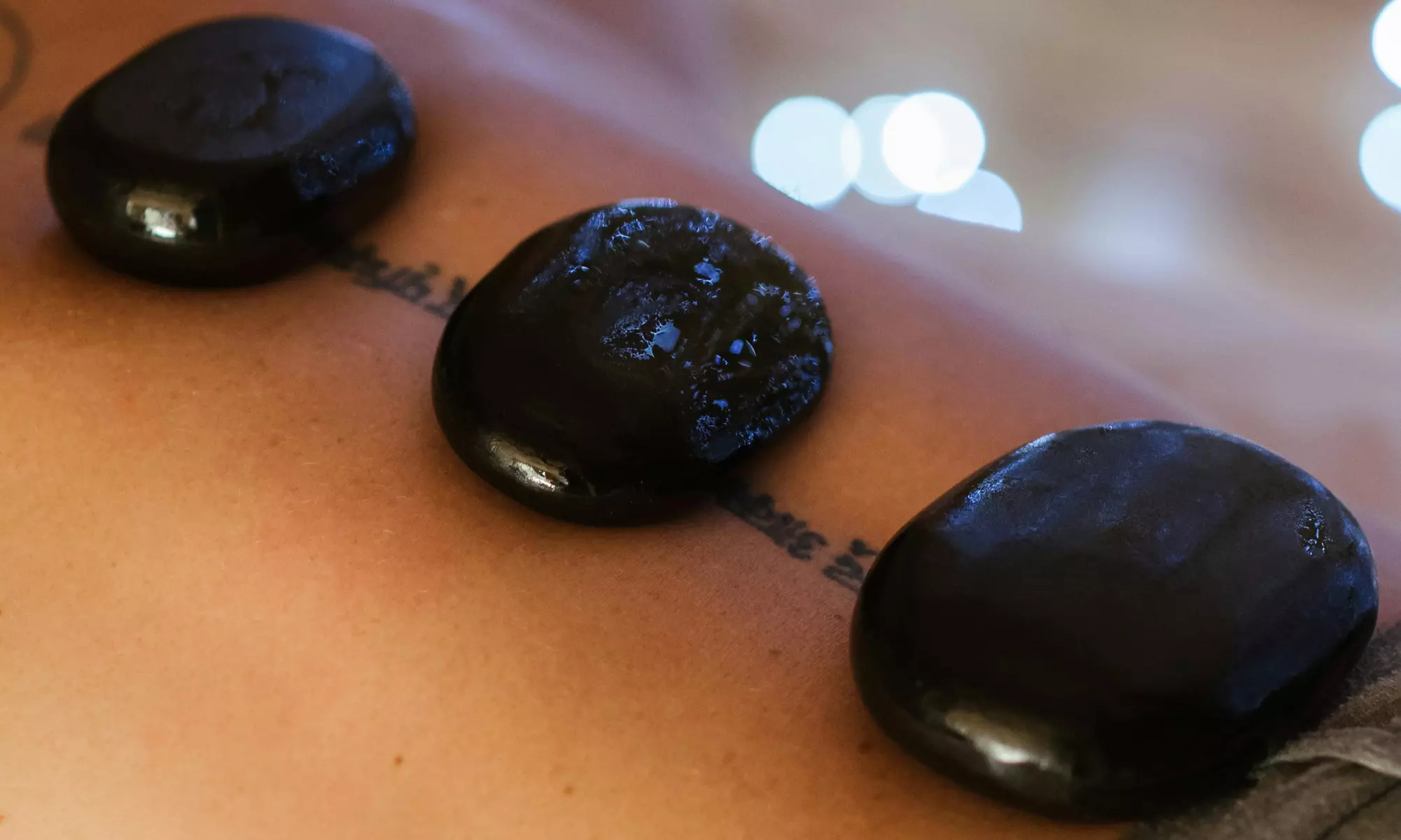 Experience Nature Cure Solutions' Relaxation Hot Stone Massage and Chakra Healing Session, offering up to 50% off - Primary Image