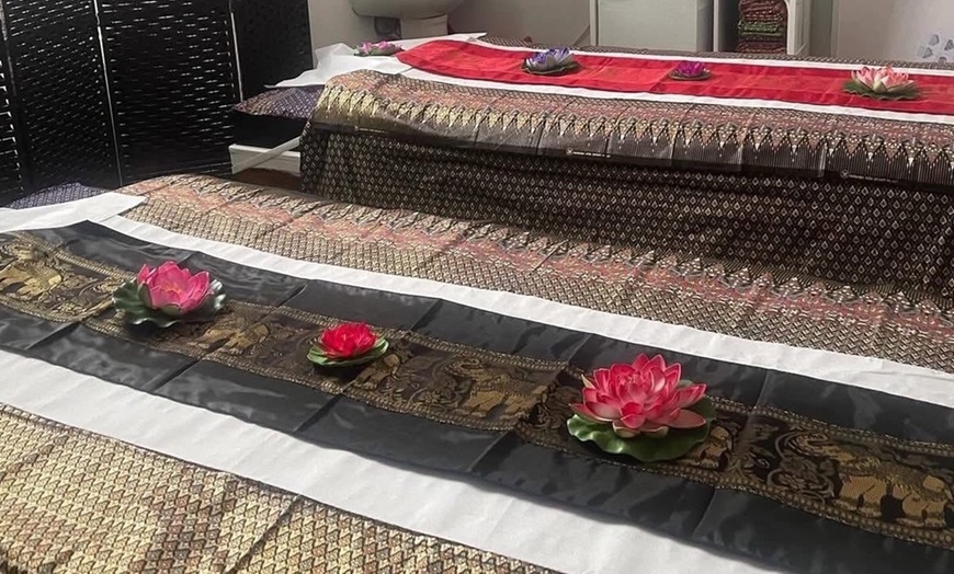 Image 2: Avail 60- or 90-Min: Choice of Thai, Deep Tissue, or Hot Stone Massage