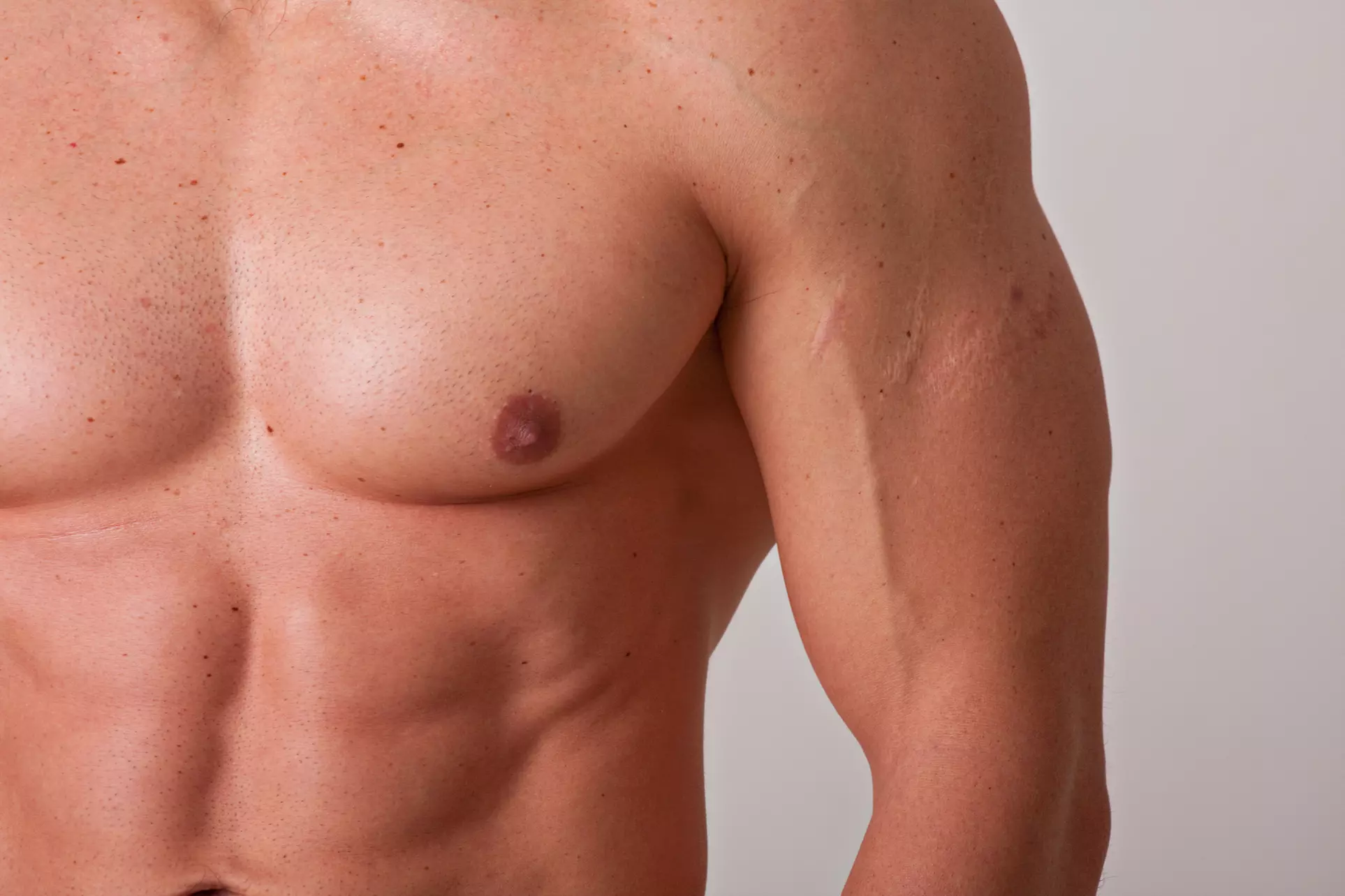 Experience smoothness at Glow Beauty Studio LV with men's back or chest waxing, using soft wax for up to 40% off - Primary Image