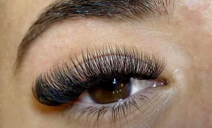 Image 4: Achieve a voluminous look with Enigma Salon And Spa's full set of eyelash extensions, up to 49% off
