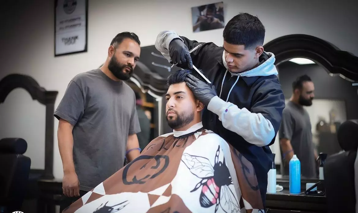 Experience Ivy League Barber Academy's expert haircuts and grooming with options like beard trims and shaves, up to 55% off - Second Medium