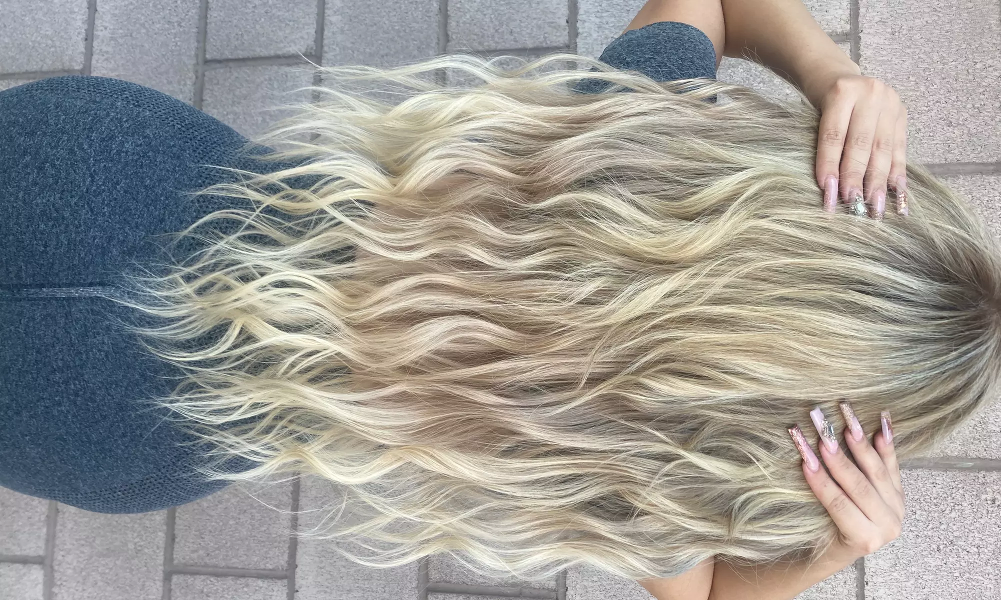 Give a Professional Touch to Hair: Brazilian Blowout or Root Color & Brazilian Blowout Special (Up to 68% Off)