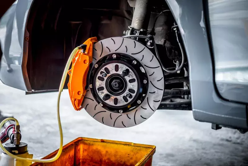 Johnson's Auto Repair: Get Front & Rear Brake Pads, Rotor Replacement & a Brake Flush (Up to 27% Off) - Primary Image