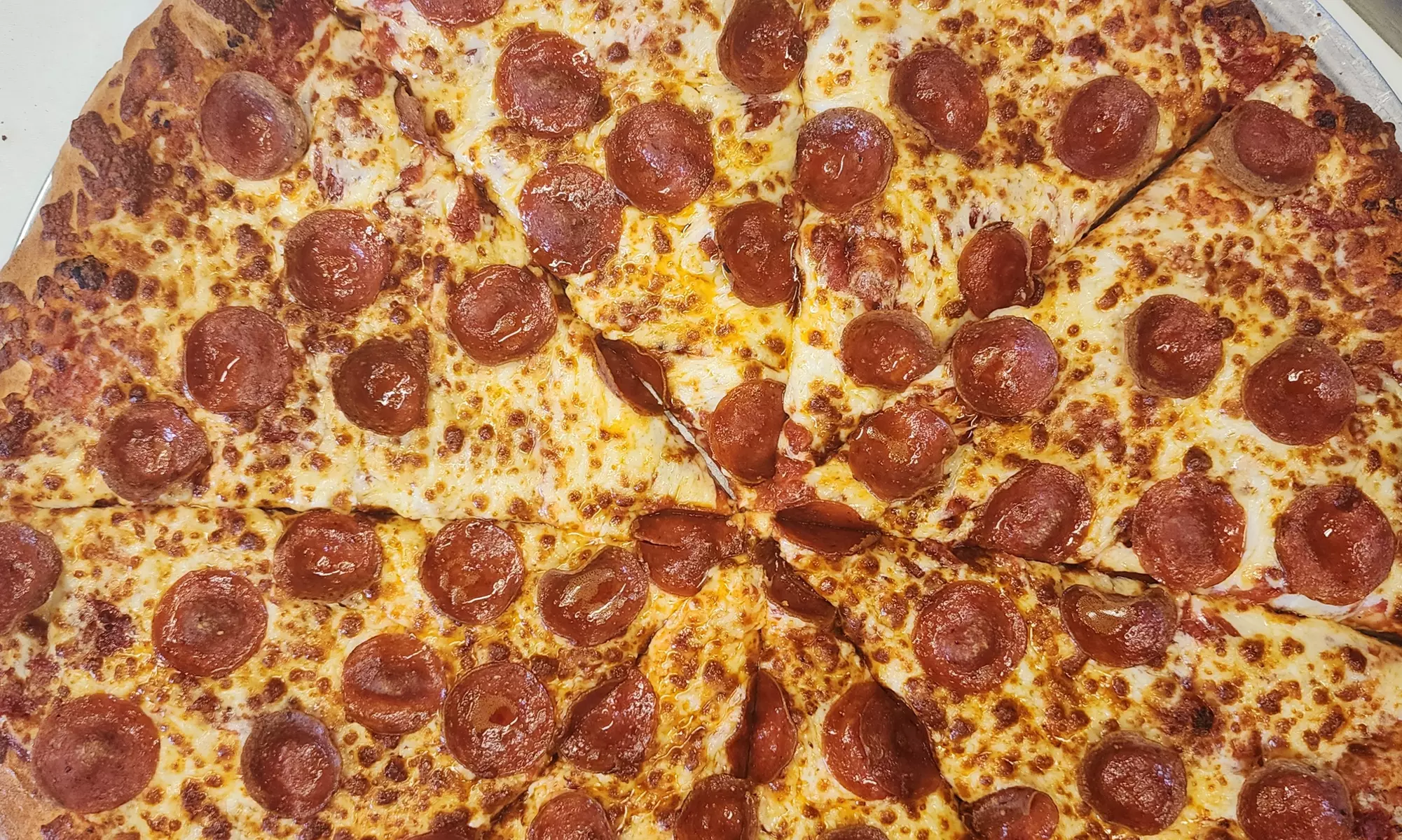 Up to 50% Off on Pizza at GG's Pizza - Primary Image