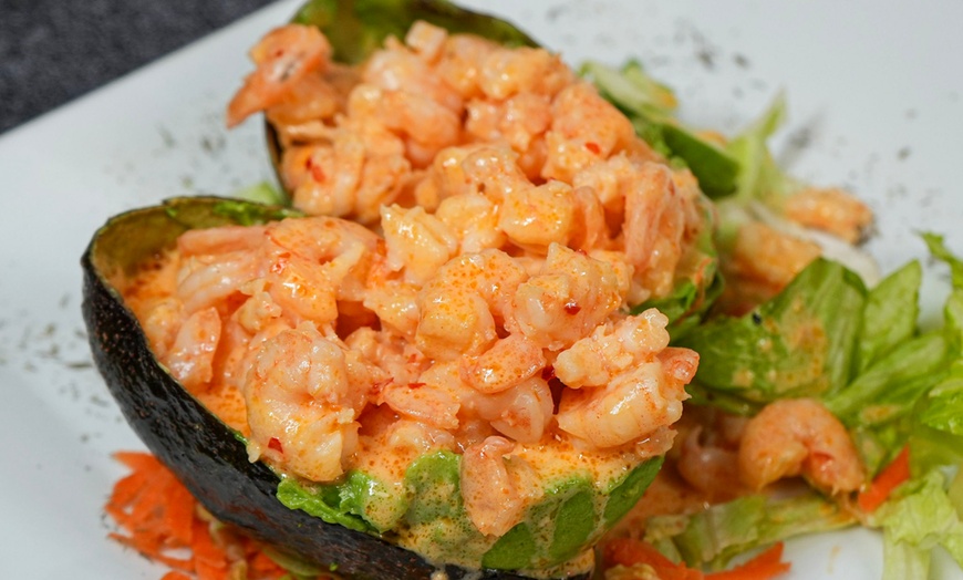 Image 5: Enjoy American-Colombian Dishes with Up to $150 Towards Food & Drinks